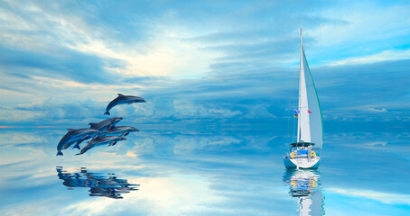 Aufkleber - Group of dolphins jumping on the water at bright blue sky with A white sailing yacht (boat) on the calm sea