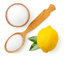 Citric Acid In A Wooden Plate And Spoon With Lemon Isolated. Lemon Acid Top View