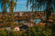 © Adsloboda - Autumn nature of Perm Krai. Kungur cityscape with houses and the Sylva River on a sunny day.