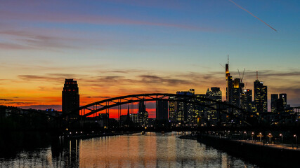 Wall Mural - Frankfurt on Main Germany view over the Main river to the skyline of financial district in the evening