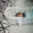© CWP, LLC/Stocksy - Baby sleeping in Basinet