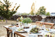 © Trinette Reed/Stocksy - Messy table of food after a Farm To Table dinner party