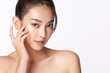 © kitthanes  - Beautiful young asian woman with clean fresh skin on white background, Face care, Facial treatment, Cosmetology, beauty and spa, Asian women portrait