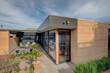 © Rowena Naylor Photography/Stocksy - Contemporary home made with Rammed Earth building matierial