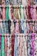 © Mellimage/Stocksy - Scarfs at the market