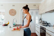 © Jayme Burrows Photography/Stocksy - Italian Woman Chops Strawberries