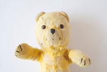 A Well Worn And Loved Old Teddy Bear