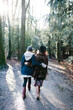 © Ivo de Bruijn/Stocksy - Two young women walking in the forest photographed from the back