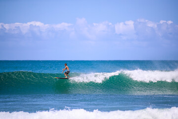 Wall Mural - Surfing at Hanalei Beach, Kauai, Hawaii