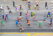 © yuko hirao/Stocksy - Colorful marathon runnered viewed from above
