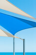 © Robert Lang Photography/Stocksy - Blue and white shade sails