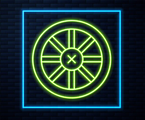 Wall Mural - Glowing neon line Old wooden wheel icon isolated on brick wall background. Vector.