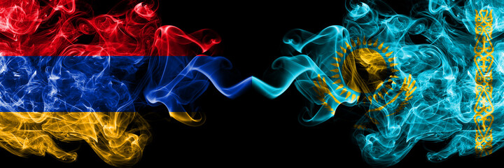 Armenia vs Kazakhstan, Kazakhstani smoky mystic flags placed side by side. Thick colored silky abstract smoke flags