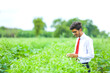 © PRASANNAPIX - young indian agronomist at field