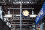 Fototapeta Big Ben - The central station of Hamburg, Germany. Focus on a plate with the text 
