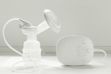 electric breast pump on the white background