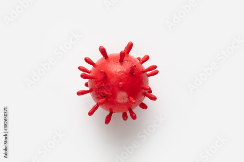 A photograph of a large red virus sculpture. The artwork inspired by the Covid-19 lockdown of 2020