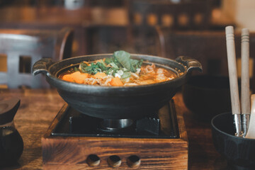 Wall Mural - Japanese Sukiyaki in traditional cast iron pot