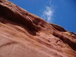 © Alan Lim - Looking up to a natural organic cliff canyon red rock in an outback desert