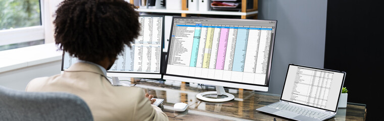 Poster - African American Analyzing Spreadsheet Data