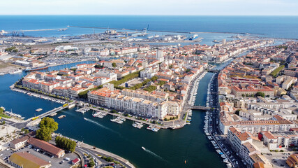 Aerial view of the old town center of Sete in the South of France - Two urbanised islands surrounded with ancient canals between the Mediterranean Sea and the Pond of Thau