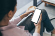 © panitan - cell phone mockup blank white screen.woman hand holding texting using mobile on desk at coffee shop.background empty space for advertise.work people contact marketing business,technology