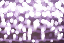 Purple Abstract Bokeh Background On A Black Background. Creative Design.