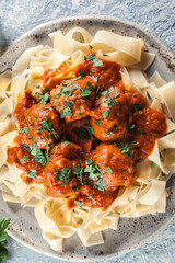 Sticker - Meatballs with tomato sauce served with pappardelle pasta