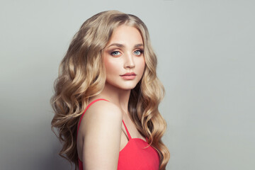 Wall Mural - beautiful blonde hair model woman with long blonde hairstyle on white background