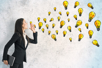 Poster - Businesswoman with drawing yellow lamps on concrete wall.