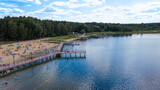 Fototapeta Fototapety pomosty - Widok z lotu ptaka na główną plażę nad jeziorem Głębokie, lubuskie, Polska
