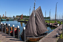 The Harbor Of The Zuiderzee Museum With The Old Fishing Boats Of Enkhuizen.