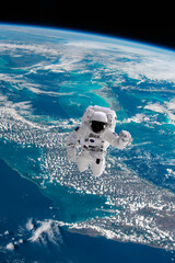 Wall Mural - astronaut walking in space with earth background. elements of this image furnished by nasa