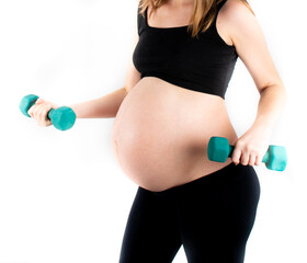 Wall Mural - Active healthy pregnant woman exercising with dumbells, isolated on white background.