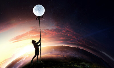 Wall Mural - Kid boy catching moon . Mixed media