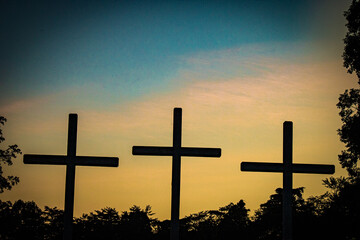 crosses at sunset