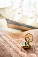 Retro Styled Golden Antique Compass (sundial), Wooden Tall Ship Scale Model And Old White Nautical Chart Close-up. Vintage Still Life. Sailing, Travel, Navigation Concepts. Collecting, Souvenir, Gift