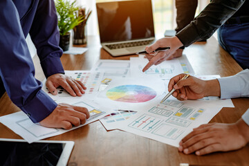 Designer men planning develop application develop for mobile phone.