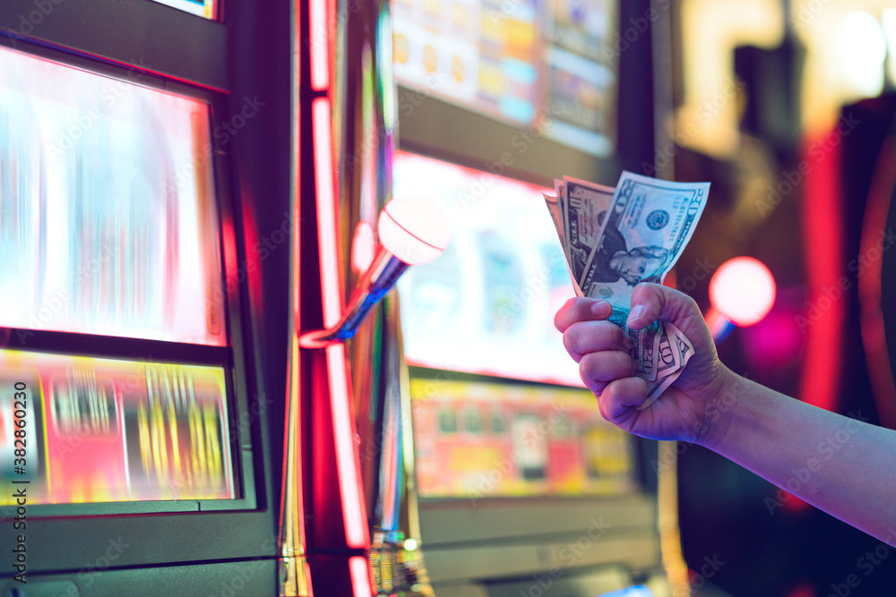 Slot Machine Play Time Female Gambler Hand Hold Money Bill Ready To Win The Game With One Best Shot Casino Close Up Wall Mural Whyframeshot Slot Machine Play Time Female Gambler Hand Hold Money Bill Ready To Win The Game With One Best Shot Casino Close Up Wall Mural Whyframeshot