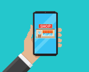 Fototapete - Pixel art vector illustration of hand holding mobile with digital shop on screen