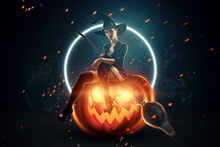 Creative Background Witch Girl With Broom Sits On Halloween Pumpkin. Beautiful Young Woman In A Witch Hat. Halloween Flyer Concept, Poster, Copy Space, Mixed Media.
