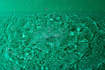 Wall Mural - splash of water on black isolated background