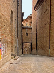 Canvas Print - Italy, Marche, Corinaldo downtown medieval street. 