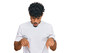 © Krakenimages.com - Young arab man wearing casual white t shirt pointing down with fingers showing advertisement, surprised face and open mouth