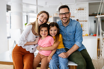 Wall Mural - Happy family having fun time at home