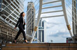 © geargodz - business woman walking in city