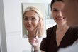 © Yakobchuk Olena - Smiling attractive lady enjoying after rejuvenating facial treatments