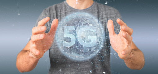 Poster - businessman holding a 5g connection with data surrounding - 3d rendering