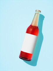 Leinwandbilder - Single transparent glass bottle laying on light blue background.