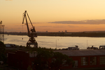 Heavy crane in river cargo port